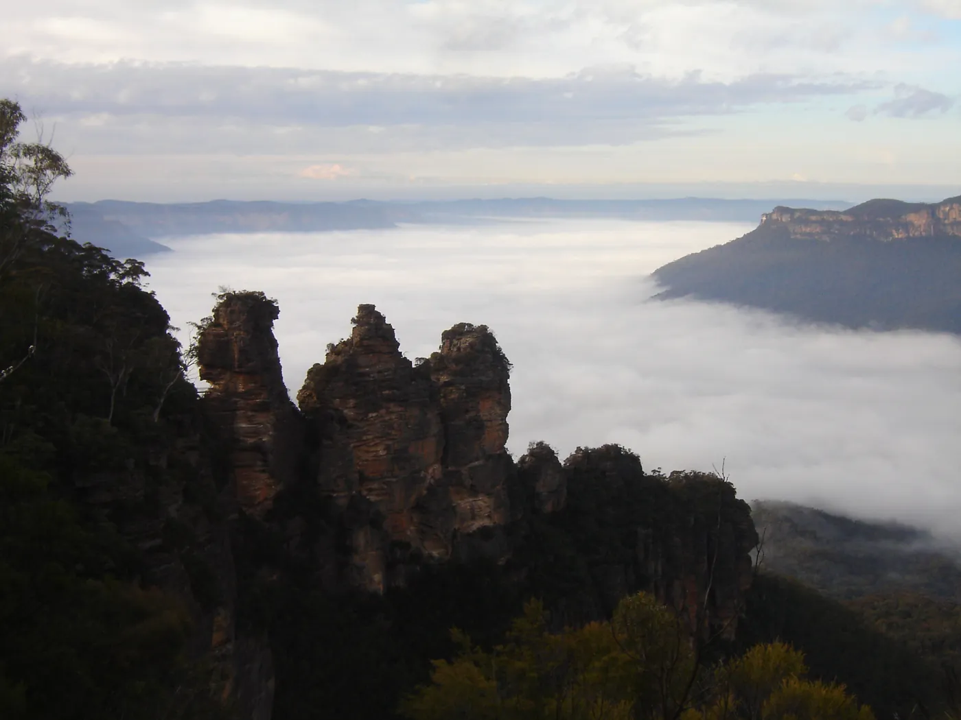 Cloud filling the valley below the Three Sisters in the Blue Mountains