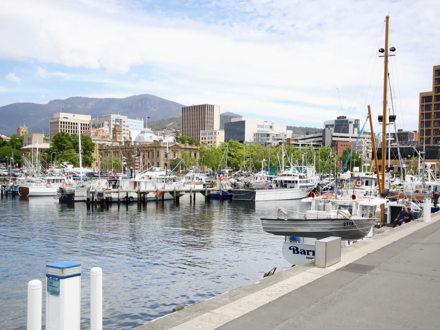 Boats in the Hobart waterfront docks, with kunanyi / Mount Wellington behind