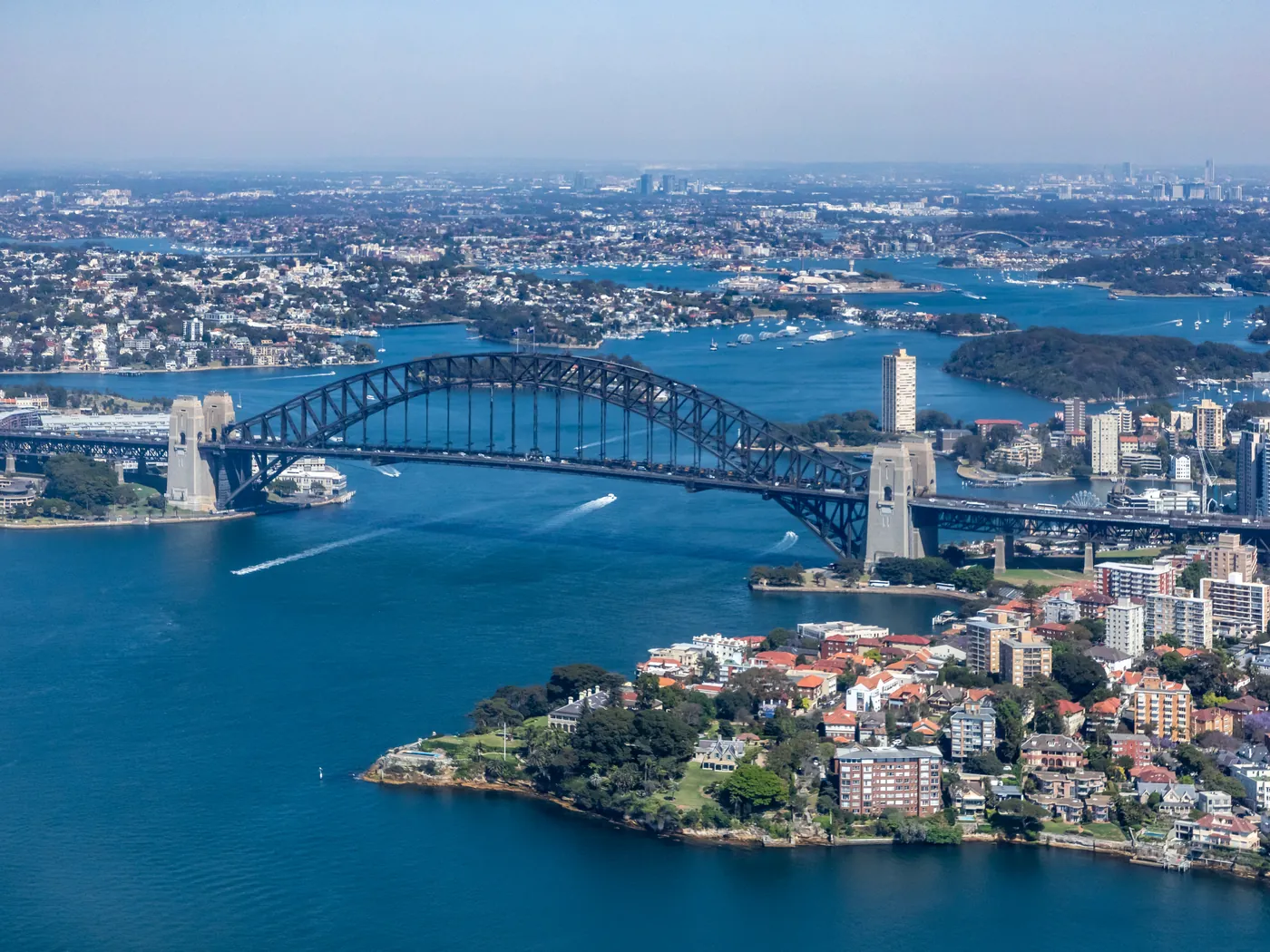 Sydney Harbour from the air, with the Harbour Bridge and the harbourside suburbs