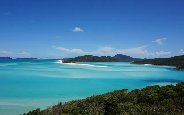 The white silica sand and turquoise water at the northern end of Whitehaven Beach