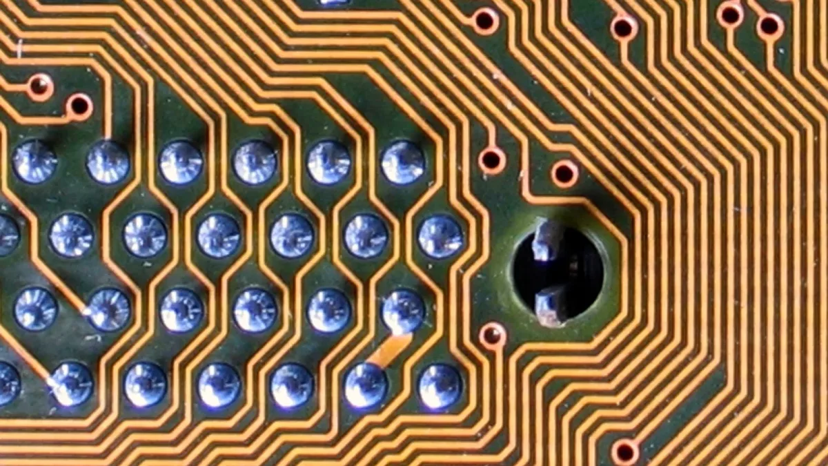 Copper traces winding across a printed circuit board