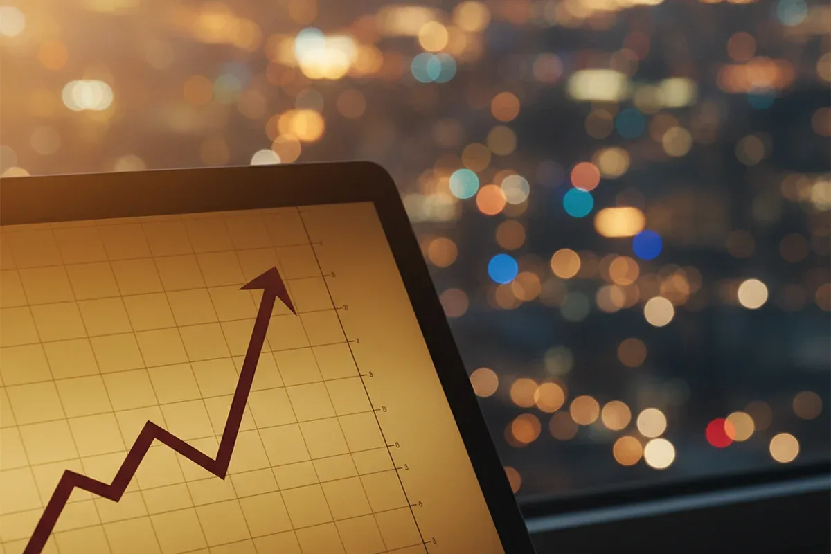 Side-by-side pricing calendars on a monitor showing weekend rates priced higher than weekdays across three months