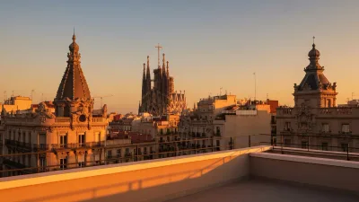 Barcelona Sagrada Familia with luxury apartment buildings in Eixample