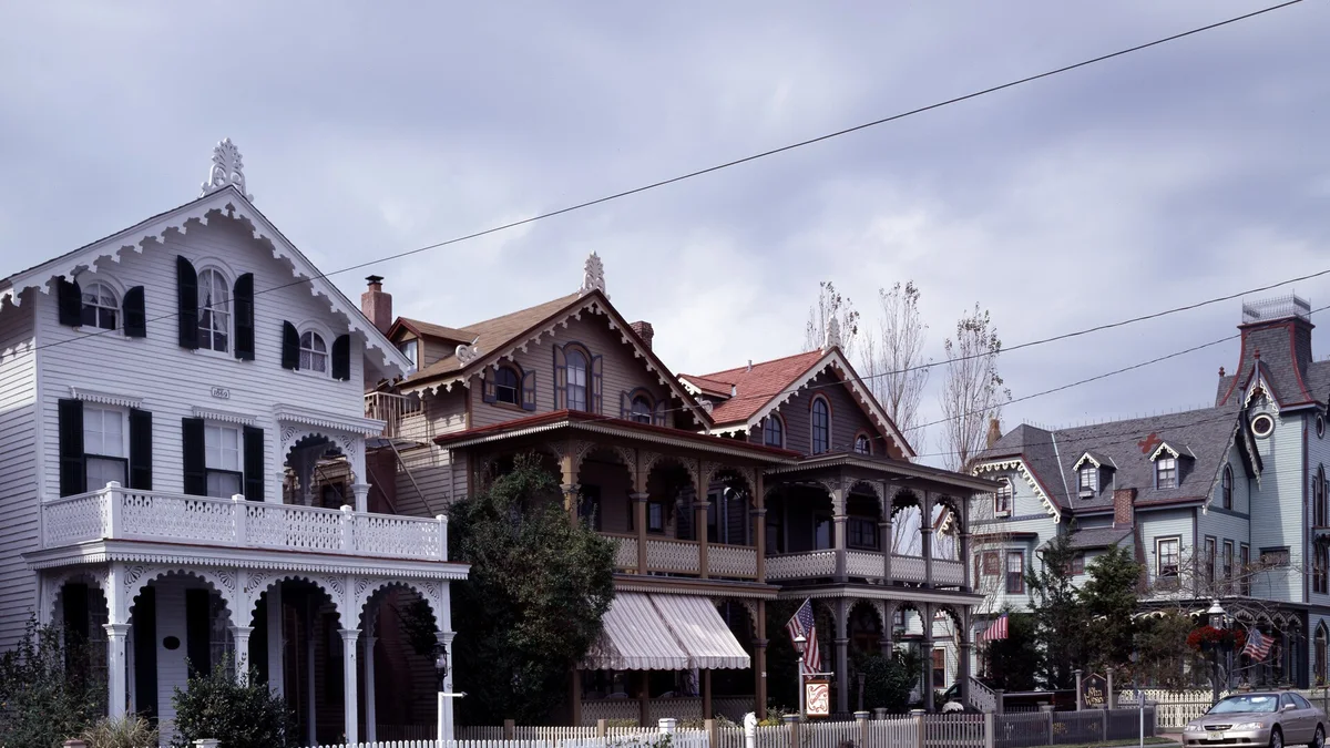 Ornate Victorian cottages with decorated porches in Cape May, New Jersey