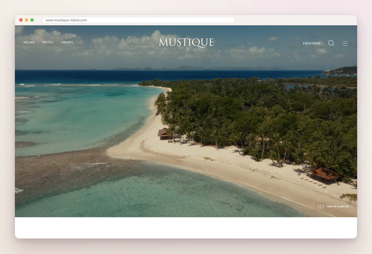 The Mustique Company website with an aerial photo of a Mustique beach and an Enquiries link in the header