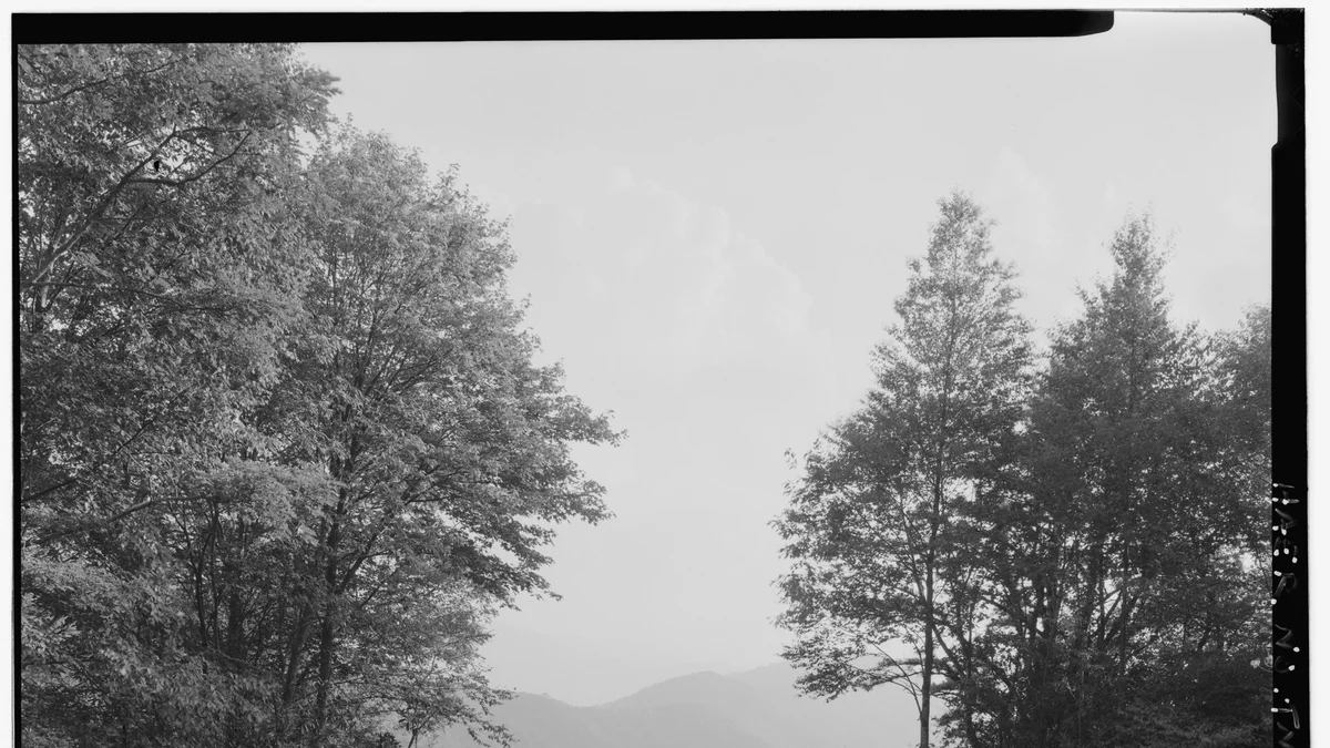 Layered blue ridges of Great Smoky Mountains National Park — the scenery that drives Gatlinburg cabin demand