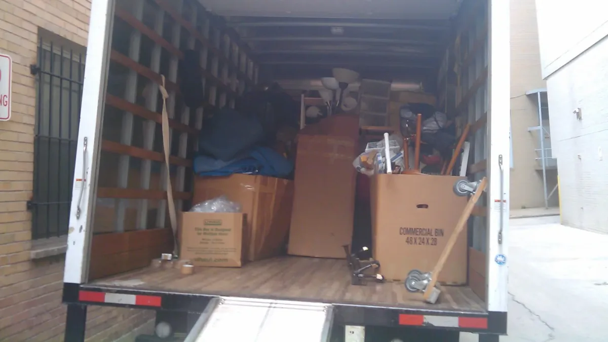 A moving truck loaded with boxes