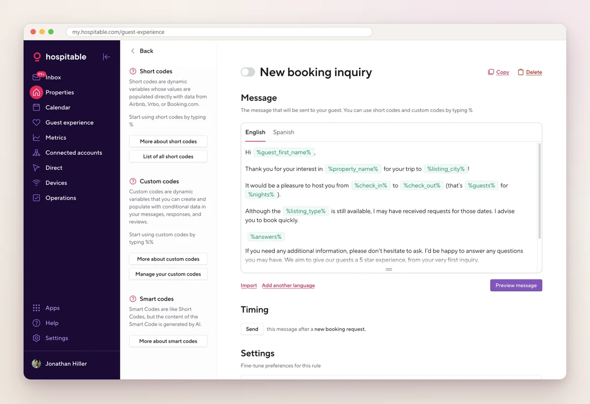 Hospitable message rule editor for a new booking inquiry with English and Spanish versions, guest and property short codes in the text, timing settings, and a side panel explaining short codes, custom codes and AI smart codes