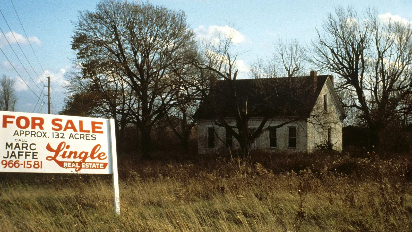 A rural property with a for-sale sign posted in front, Indiana
