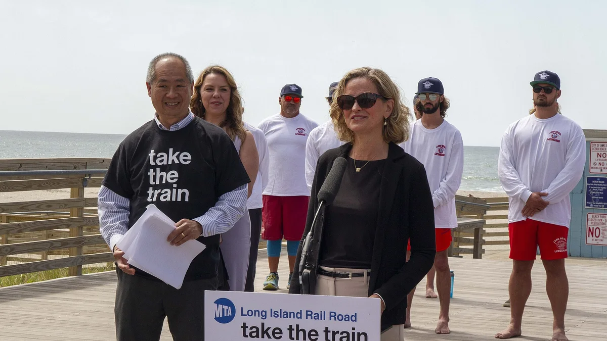 A busy American summer beach boardwalk — the demand surge hosts plan the whole year around