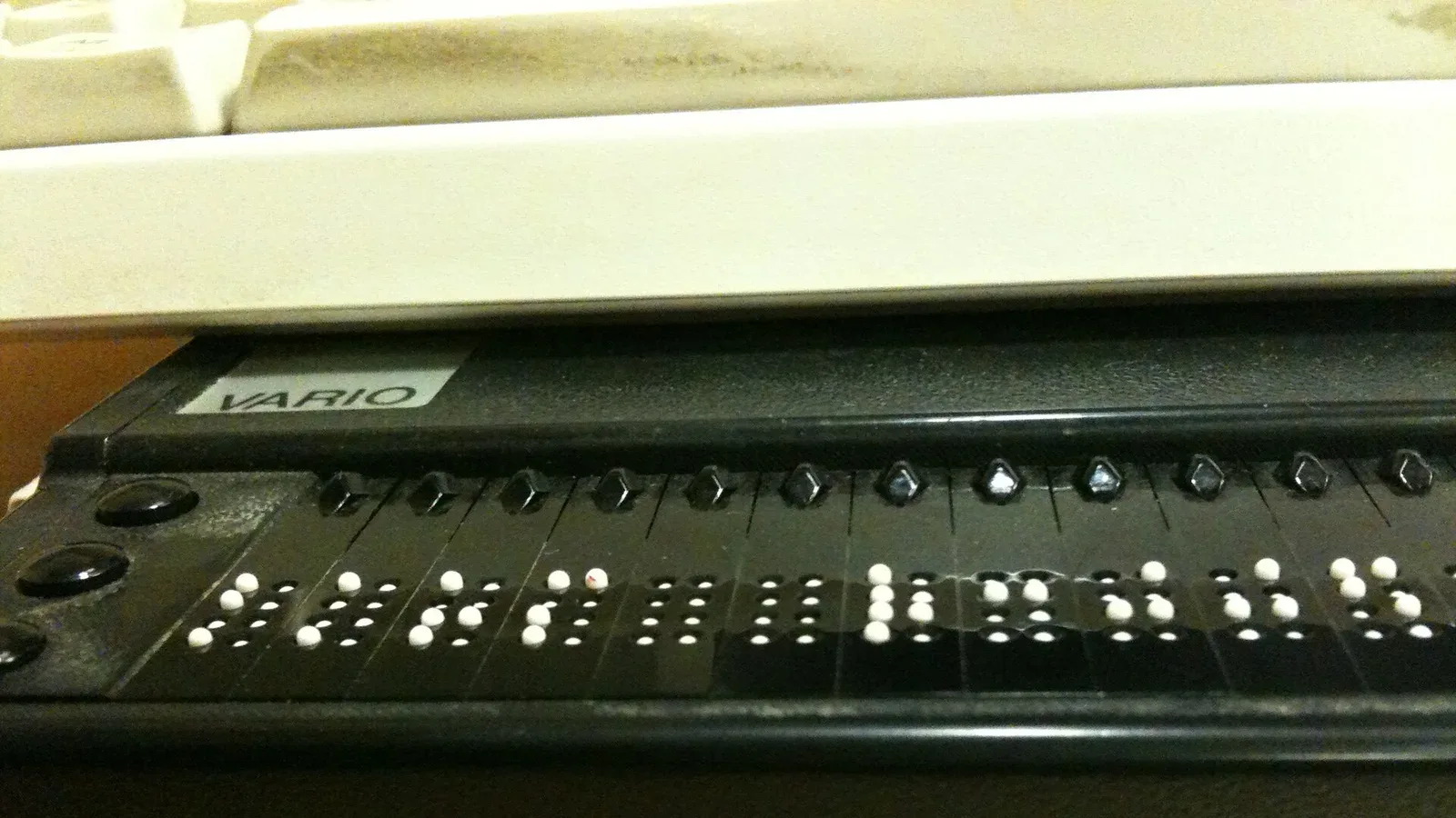 A refreshable braille display connected to a computer