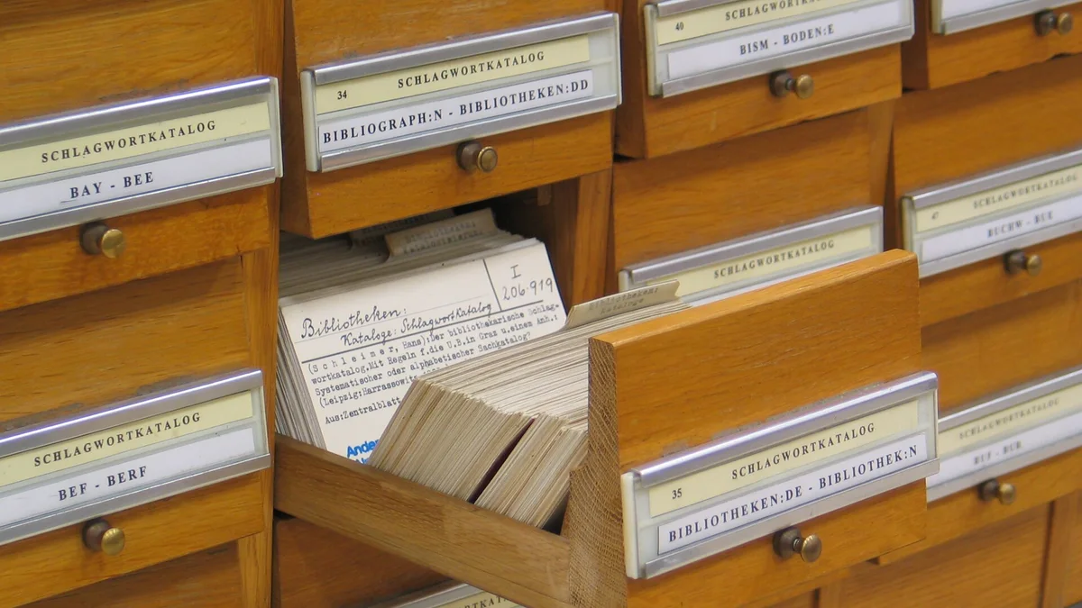 Rows of wooden drawers in a library card catalogue