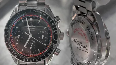 Two chronograph watches photographed close up