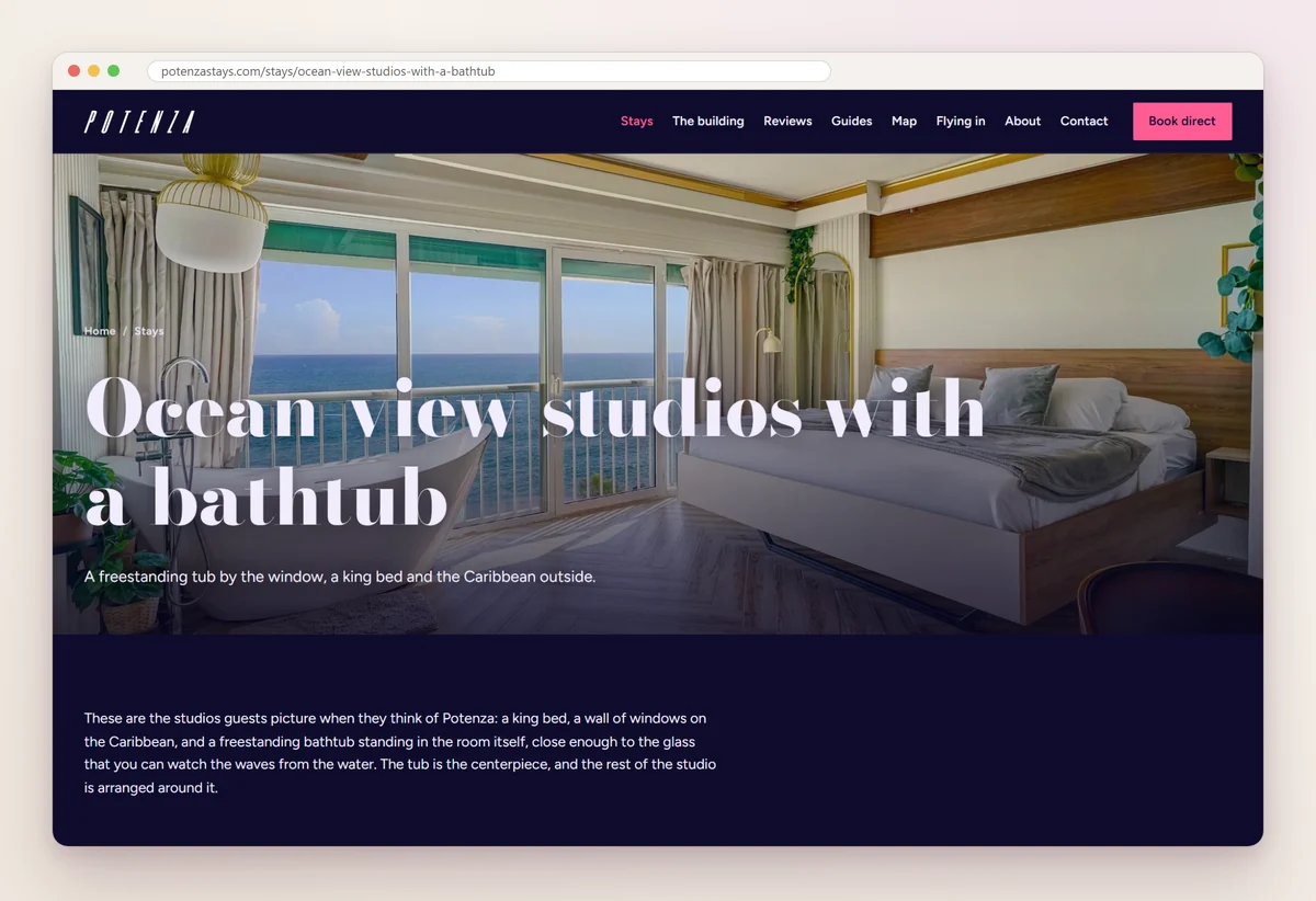 Potenza Rentals' page for its ocean-view studios with a bathtub, showing a studio with a freestanding tub by a wall of windows over the Caribbean in Santo Domingo