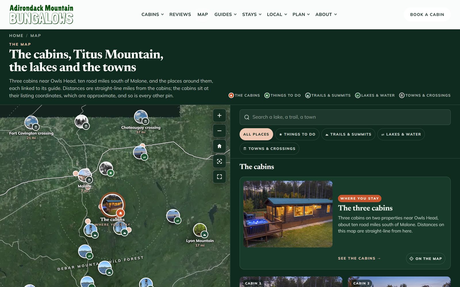 The satellite map of the cabins with pins for the trails, summits, lakes, towns and border crossings around them