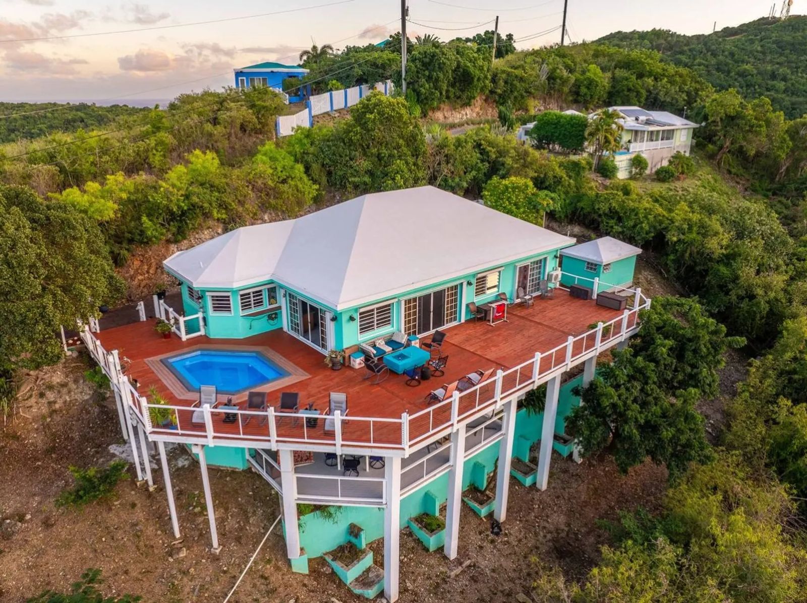 The Buck Island Overlook — the house and its pool deck on the hillside, from the air