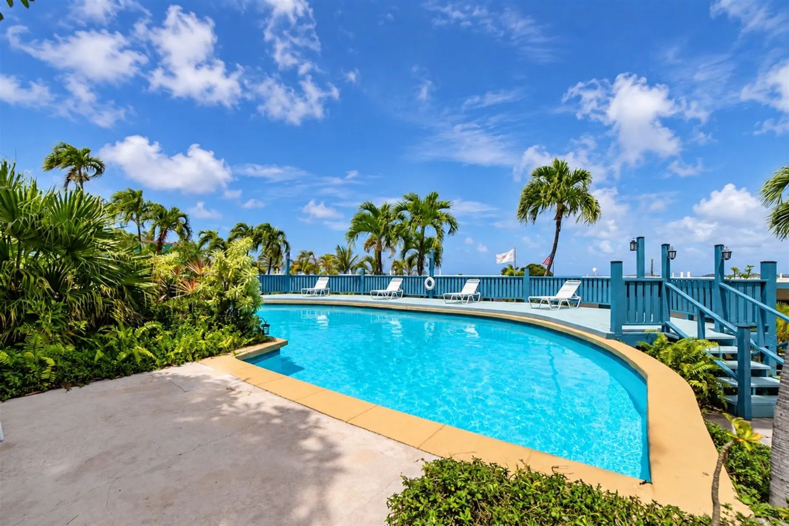 Caribbean Blue Hideaway — the pool among the palms