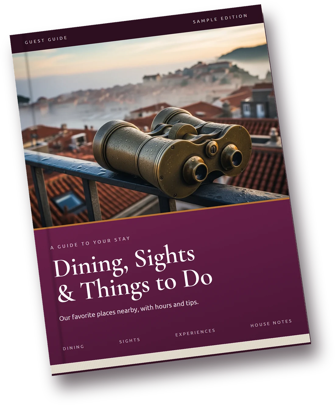 Hardcover sample guest guide titled Dining, Sights and Things to Do, with a photo of binoculars on a balcony rail above a town, resting at an angle on a dark surface