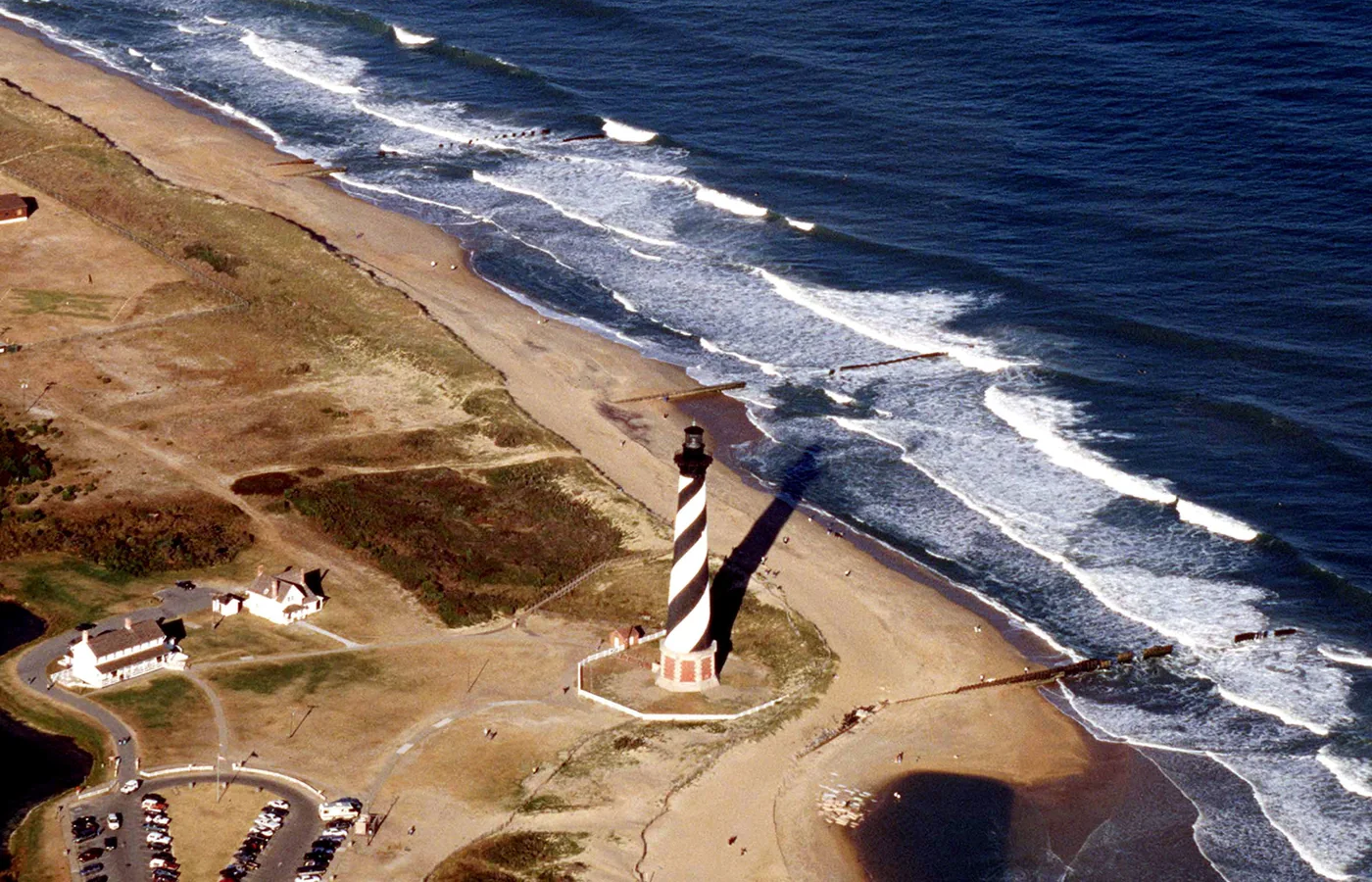 The black-and-white spiral tower of Cape Hatteras Lighthouse on the Outer Banks of North Carolina