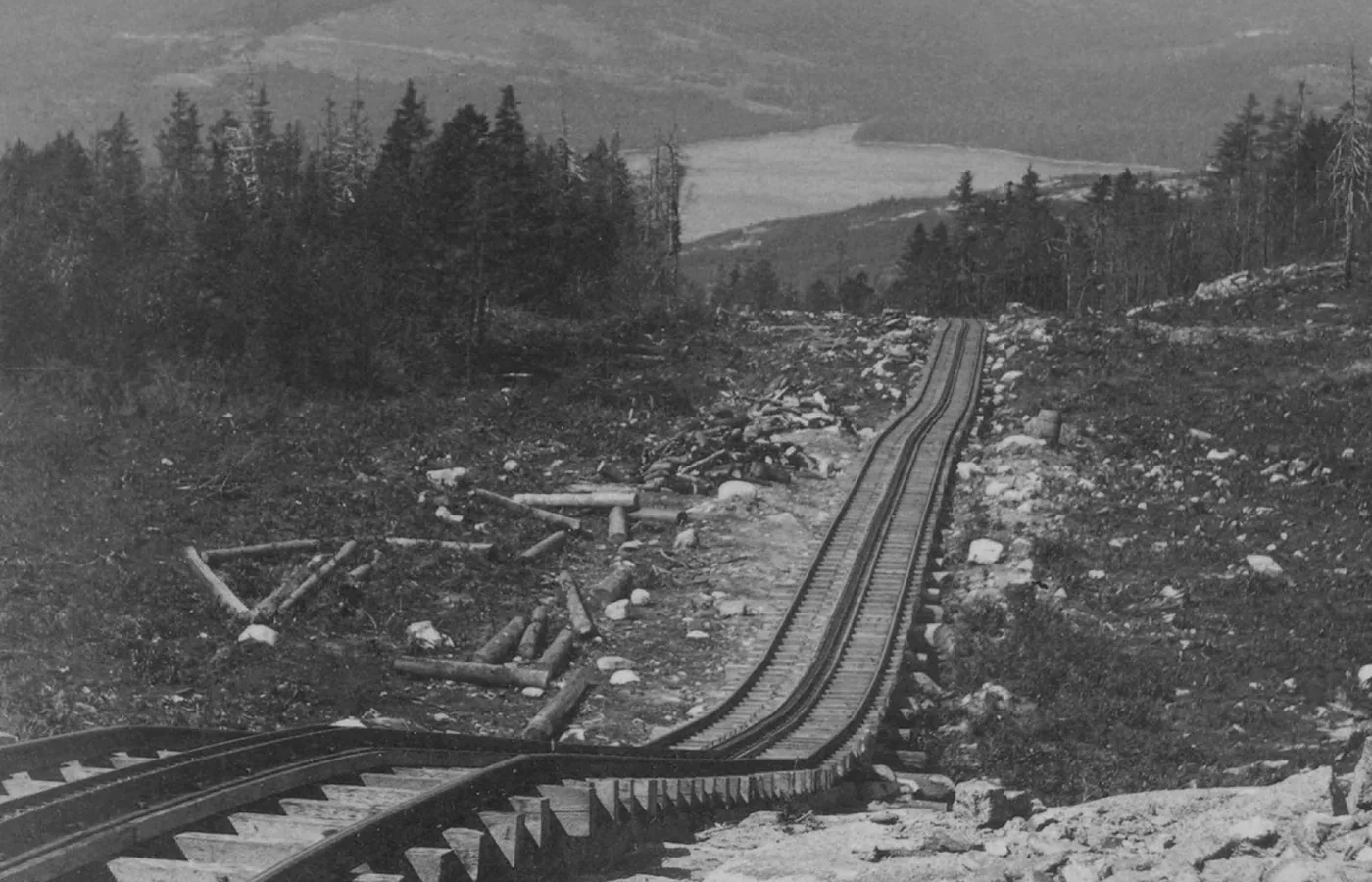 The cog rail track of the Green Mountain Railway above Eagle Lake on Mount Desert Island in the 1880s