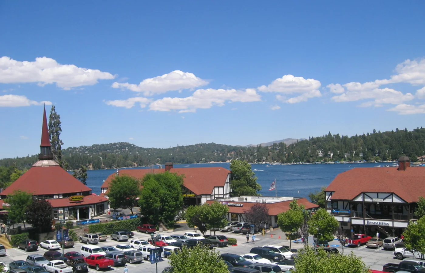 The Norman-English style Lake Arrowhead Village beside the lake
