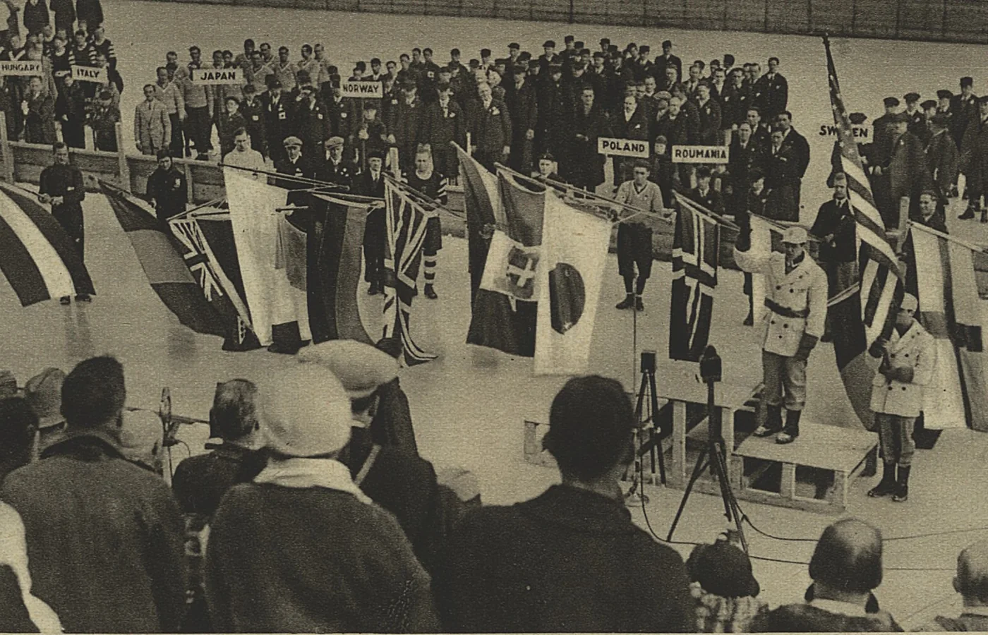 National teams and flags at the closing ceremony of the 1932 Winter Olympics in Lake Placid, New York