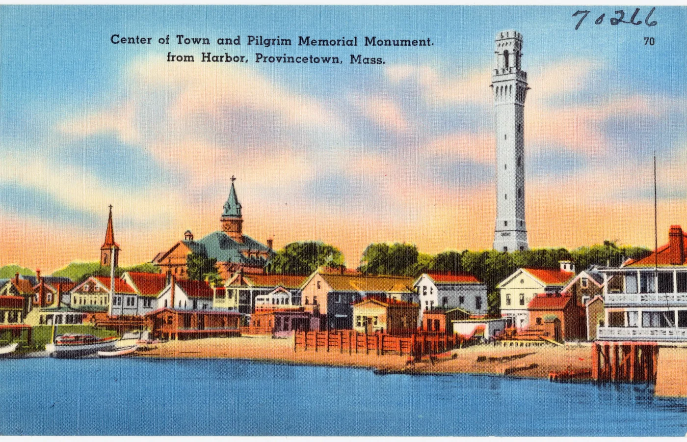 Postcard of the center of Provincetown and the Pilgrim Memorial Monument seen from the harbor