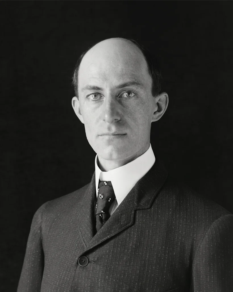 Wilbur Wright, who chose Kitty Hawk from U.S. Weather Bureau wind data and the letters of two Kitty Hawk locals in 1900