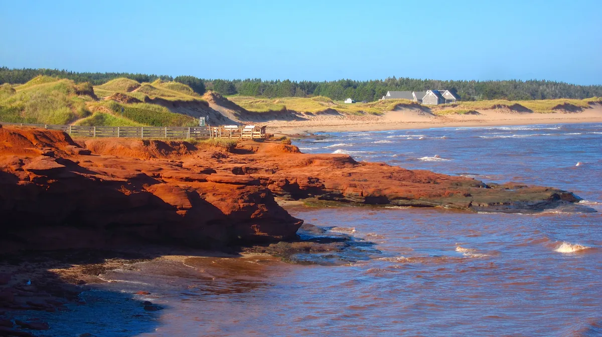 Red sandstone shore, sand dunes and the Gulf of St. Lawrence in Prince Edward Island National Park on PEI's North Shore