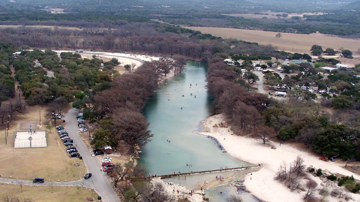 The Frio River at Garner State Park seen from Old Baldy, with the Hill Country beyond, Texas