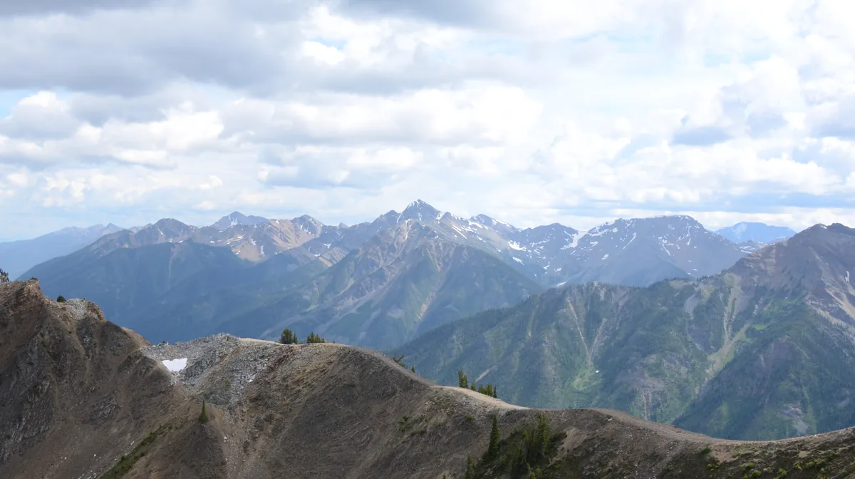 Mountain peaks seen from the summit of Kicking Horse Mountain Resort above Golden, British Columbia, in summer