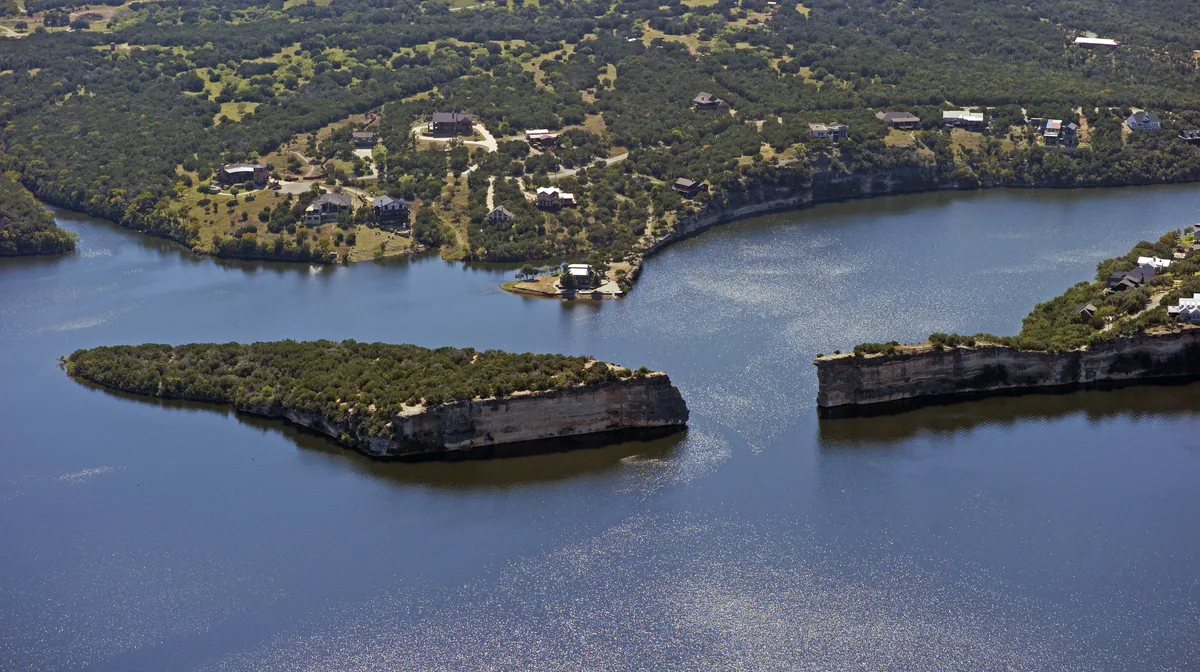 Hell's Gate cliffs and lake homes on Possum Kingdom Lake, Texas, from the air