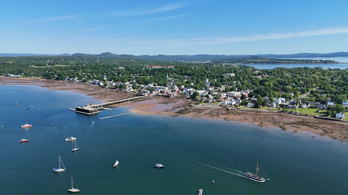 Saint Andrews, New Brunswick, from the air, with its wharf and sailboats on Passamaquoddy Bay