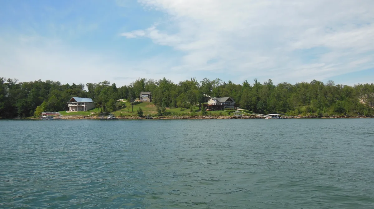 Lake homes and boat docks on the shore of Lewis Smith Lake, Alabama, seen from the water