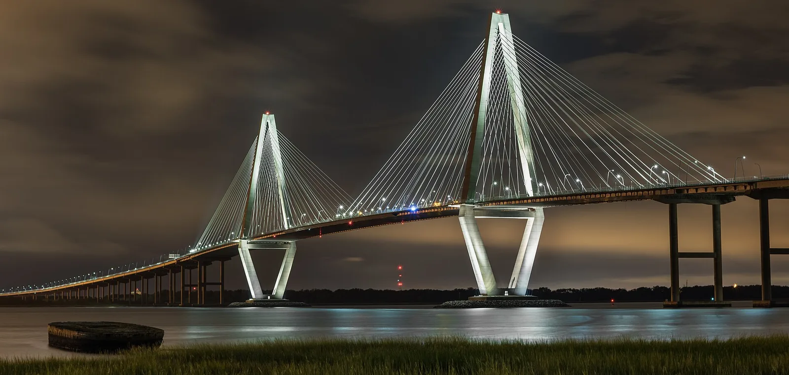 Ravenel Bridge at night from Mt Pleasant — Charleston airbnb marketing