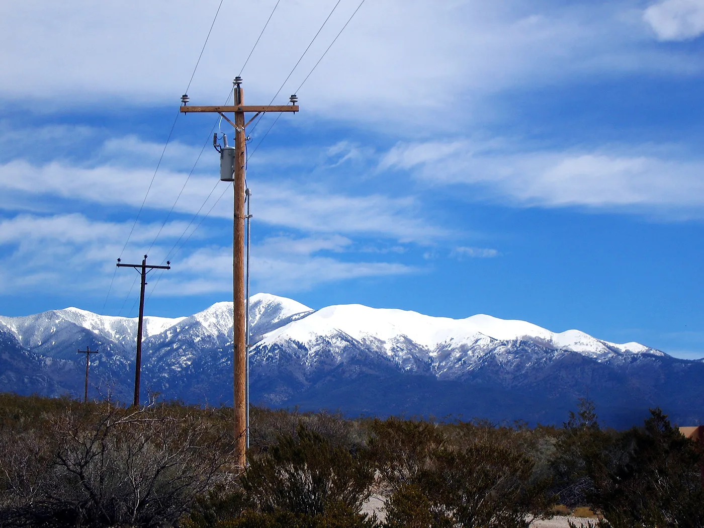 Sierra Blanca and electricity pole — Ruidoso airbnb marketing