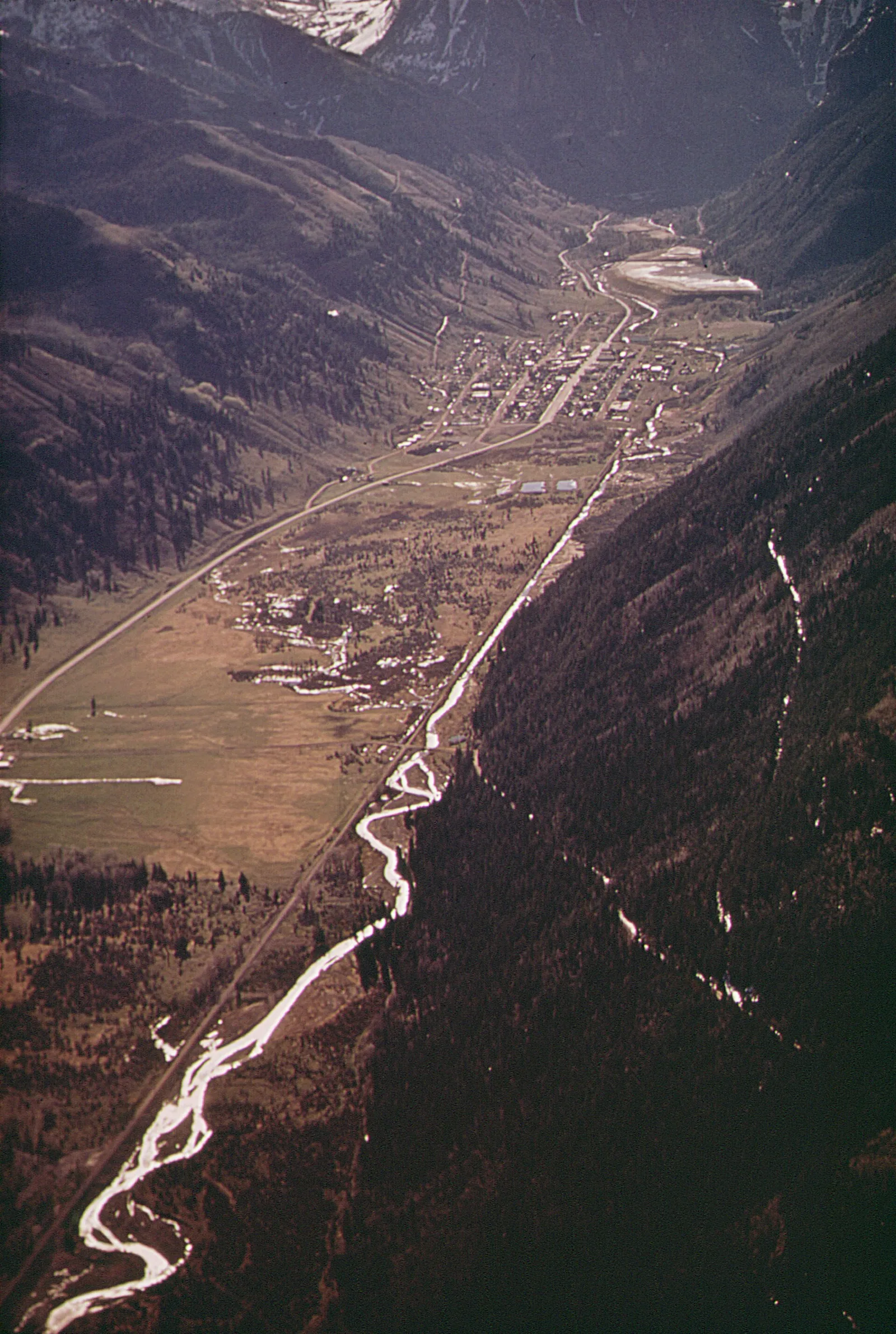 AERIAL VIEW OF TELLURIDE SHOWING NEWLY CUT SKI TRAILS (IN RIGHT FOREGROUND NARA — Telluride airbnb marketing