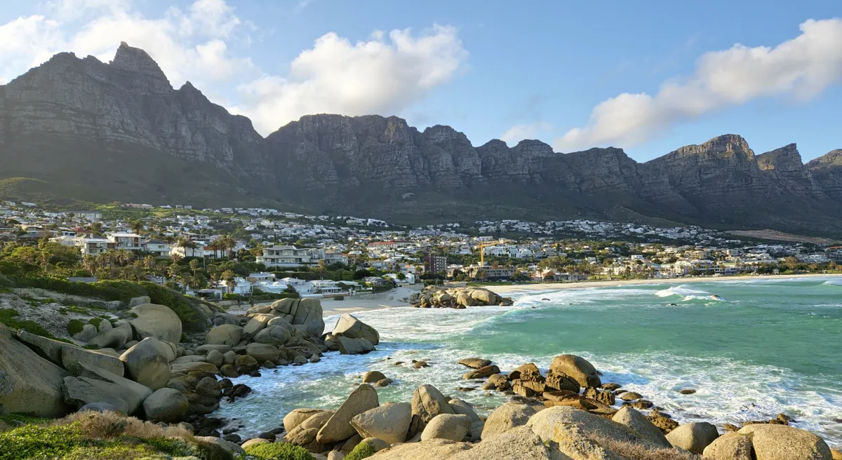 Camps Bay beach and suburb below the Twelve Apostles mountains, Cape Town